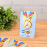 CARD MOEDINHA ABRIL AZUL AUTISMO 2025